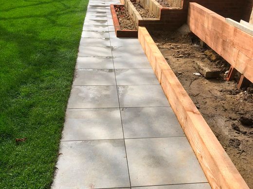 Garden patio with slab steps built by PL Taylor Landscaping