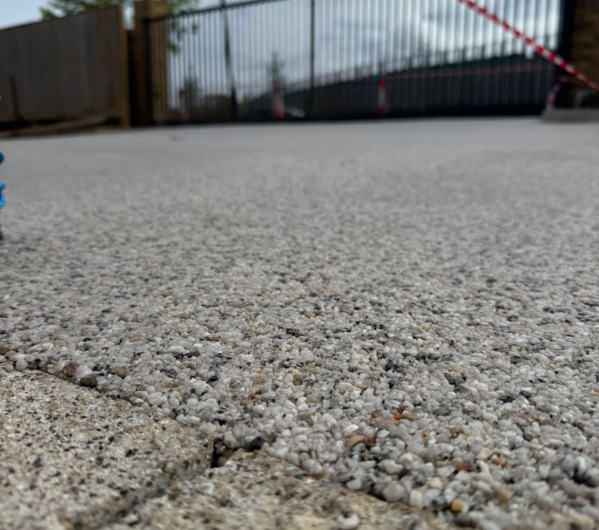 A newly laid resin-bound driveway with a smooth, seamless finish