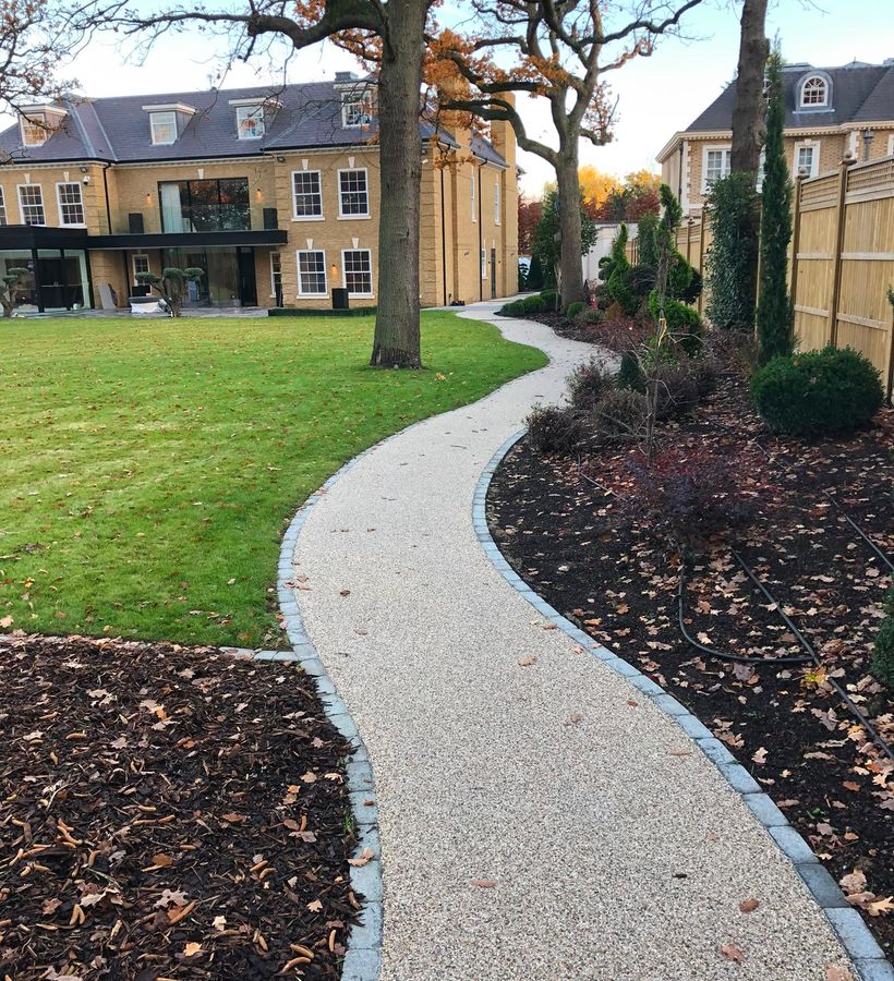 A transformed garden with terraced levels linked by wide, solid steps
